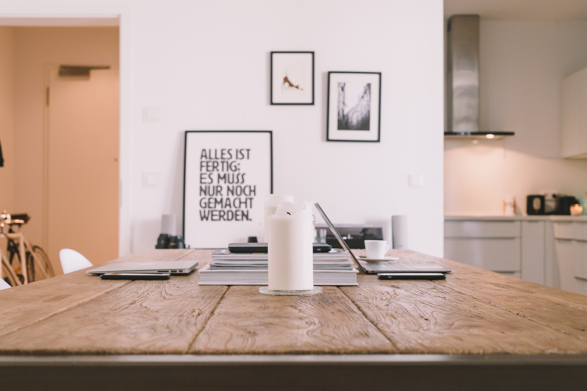 A clean home office setup showing computers seamlessly connected to a smart residential wireless network.